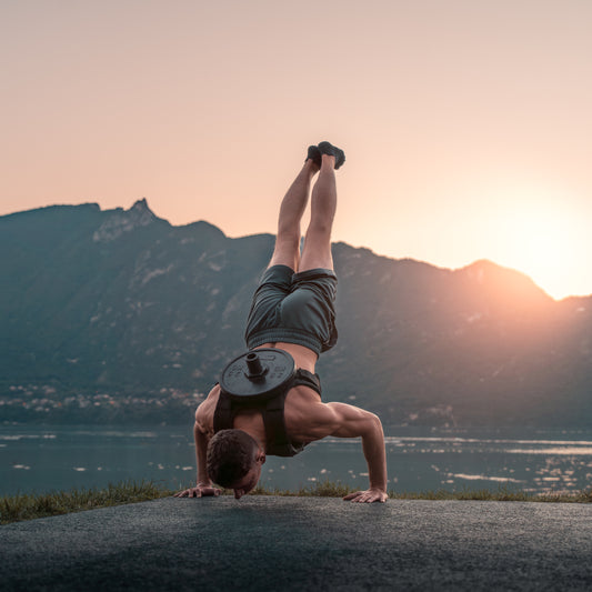Army green weighted vest plate carrier in use - strength training demonstration