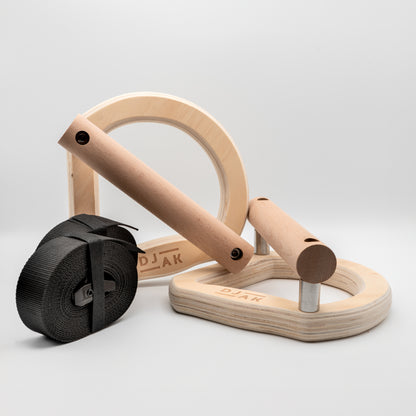 Wooden gymnastic rings parallettes for calisthenics - close-up view